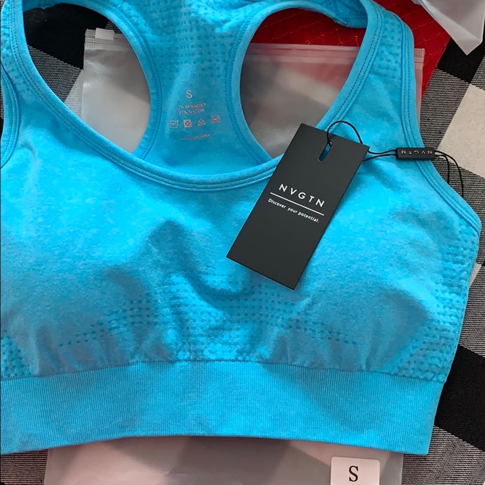 NVGTN aqua sports bra size small.
Never worn.